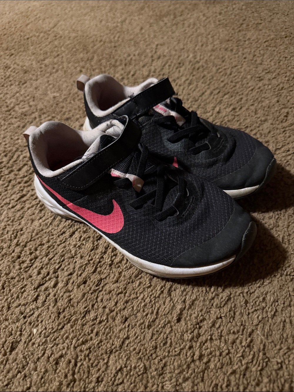Nike Kids Black Sneakers with Pink Swoosh